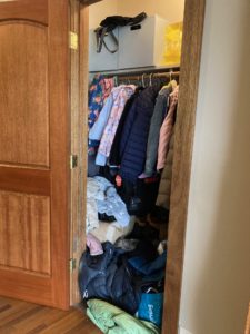 overstuffed coat closet